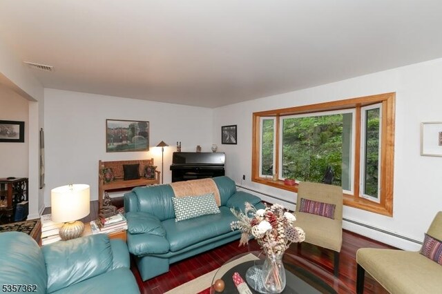 23 Horizon Dr, Roxbury Twp, NJ 07876 - living room featuring a baseboard radiator and wood finished floors