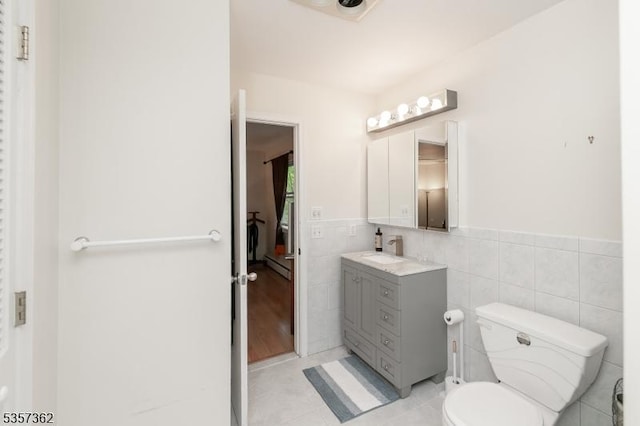 23 Horizon Dr, Roxbury Twp, NJ 07876 - bathroom with tile walls, tile patterned flooring, vanity, a wainscoted wall, and toilet