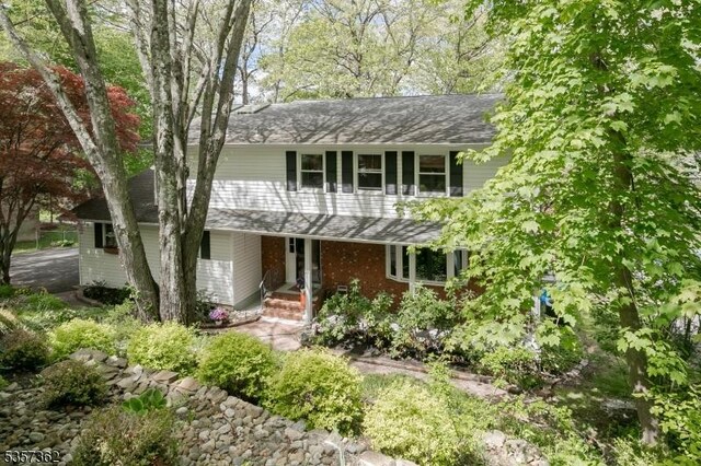 23 Horizon Dr, Roxbury Twp, NJ 07876 - view of front facade featuring covered porch and roof with shingles