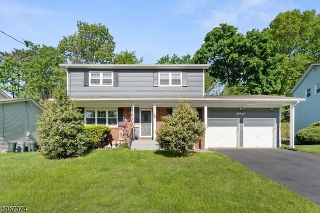 39 Circle Dr, Rockaway Twp, NJ 07866 - traditional-style house featuring a front yard, driveway, a garage, and brick siding