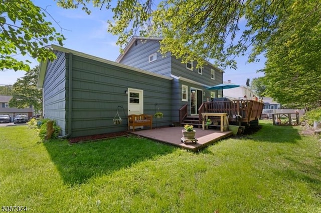 39 Circle Dr, Rockaway Twp, NJ 07866 - rear view of property featuring a deck, a lawn, and a patio