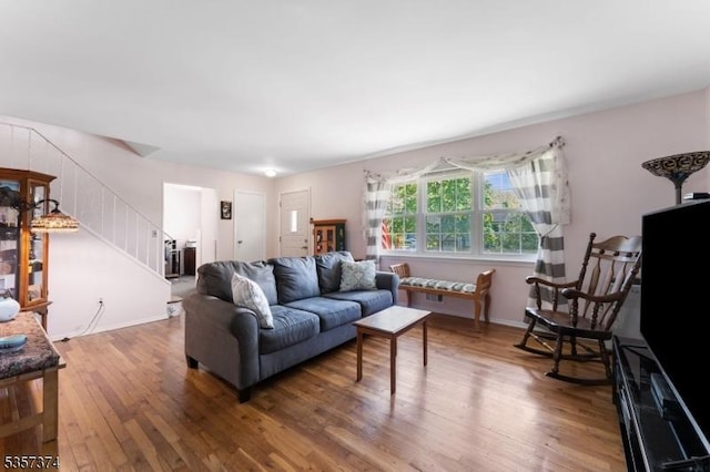 39 Circle Dr, Rockaway Twp, NJ 07866 - living area featuring stairway, wood finished floors, and baseboards