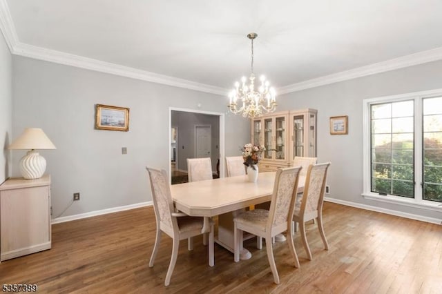 6 Wintermute Farm Ln, Tewksbury Twp, NJ 08833 - dining area featuring a chandelier, crown molding, baseboards, and wood finished floors