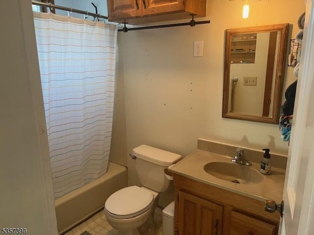 full bathroom with toilet, vanity, and shower / tub combo with curtain