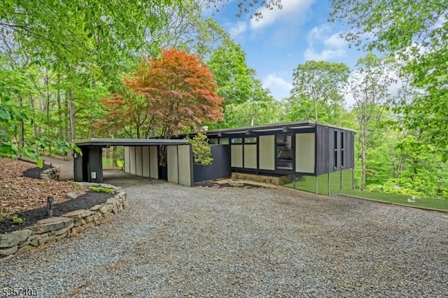18 Ridge Rd, Tewksbury Twp, NJ 08833 - view of front of home with driveway and a carport