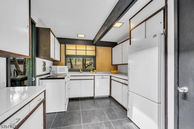 18 Ridge Rd, Tewksbury Twp, NJ 08833 - kitchen featuring white appliances, dark tile patterned flooring, beam ceiling, white cabinetry, and light countertops