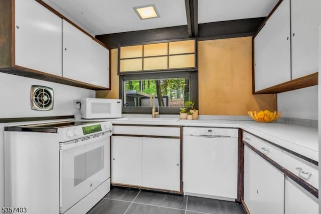 18 Ridge Rd, Tewksbury Twp, NJ 08833 - kitchen featuring white appliances, light countertops, white cabinets, and dark tile patterned flooring