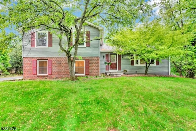 10 Hunts Mill Rd, Clinton Town, NJ 08809 - view of front of house featuring a front yard and brick siding