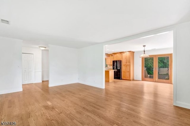 10 Hunts Mill Rd, Clinton Town, NJ 08809 - unfurnished living room featuring light wood-style floors and baseboards
