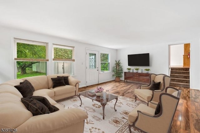 10 Hunts Mill Rd, Clinton Town, NJ 08809 - living room featuring wood finished floors, stairway, and baseboards