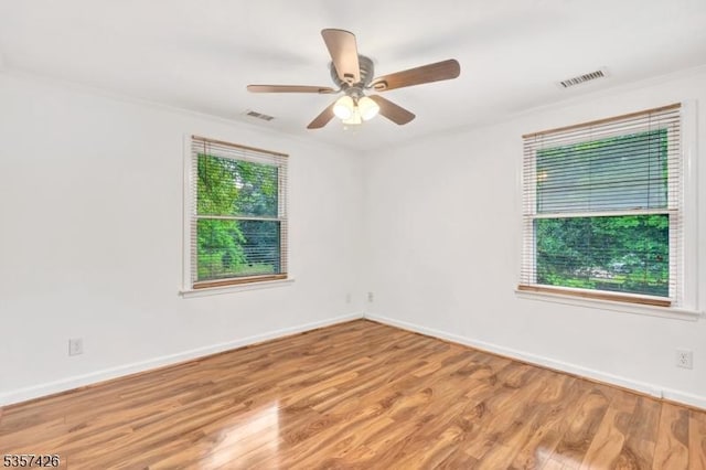 10 Hunts Mill Rd, Clinton Town, NJ 08809 - empty room with wood finished floors, baseboards, ceiling fan, and crown molding
