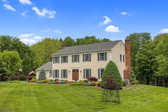 19 Bennington Dr, Mount Olive Twp, NJ 07836 - colonial inspired home featuring a chimney, a front yard, and central AC