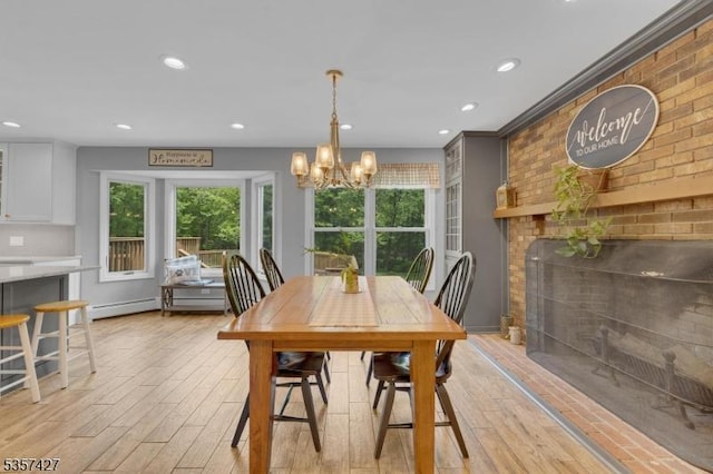 19 Bennington Dr, Mount Olive Twp, NJ 07836 - dining room with light wood finished floors, recessed lighting, a chandelier, brick wall, and baseboards