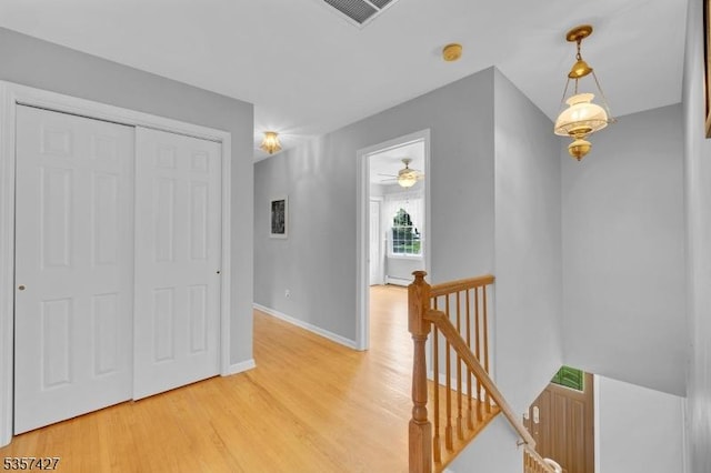 19 Bennington Dr, Mount Olive Twp, NJ 07836 - corridor featuring an upstairs landing, light wood-style floors, and baseboards