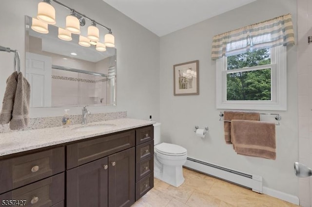 19 Bennington Dr, Mount Olive Twp, NJ 07836 - full bath with a baseboard radiator, vanity, a shower with door, toilet, and baseboards