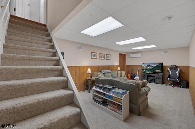19 Bennington Dr, Mount Olive Twp, NJ 07836 - carpeted living area featuring wainscoting, stairs, a drop ceiling, and wood walls