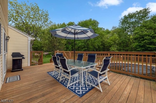 19 Bennington Dr, Mount Olive Twp, NJ 07836 - deck featuring outdoor dining space, a grill, and view of scattered trees