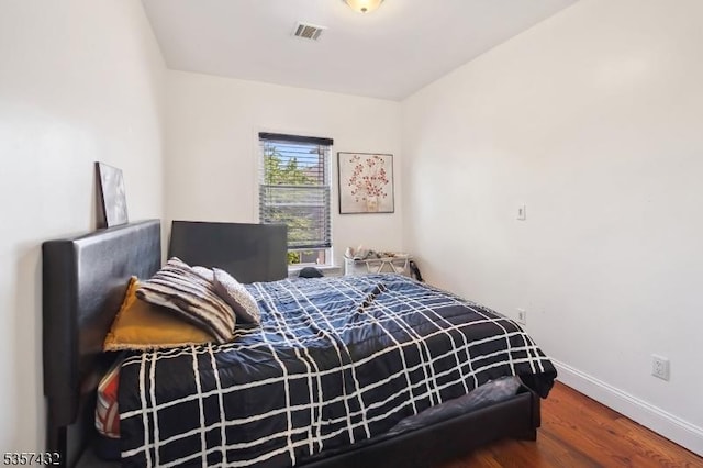 234 Lt Glenn Zamorski Dr, Elizabeth City, NJ 07206 - bedroom with baseboards and wood finished floors
