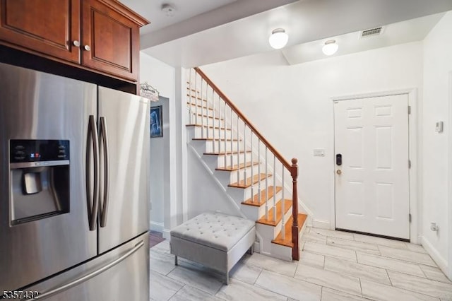 234 Lt Glenn Zamorski Dr, Elizabeth City, NJ 07206 - kitchen featuring stainless steel fridge with ice dispenser and baseboards