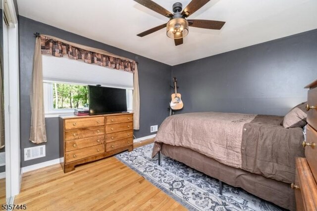 49 Sliker Rd, Lebanon Twp, NJ 08826 - bedroom featuring wood finished floors, baseboards, and ceiling fan