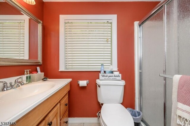 49 Sliker Rd, Lebanon Twp, NJ 08826 - bathroom with a stall shower, toilet, vanity, and baseboards