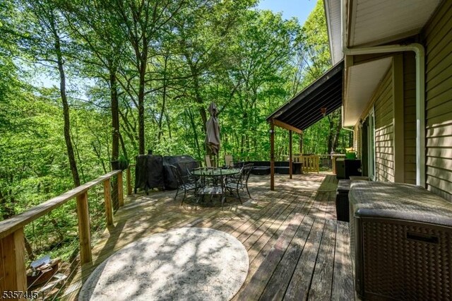 49 Sliker Rd, Lebanon Twp, NJ 08826 - wooden terrace with outdoor dining space