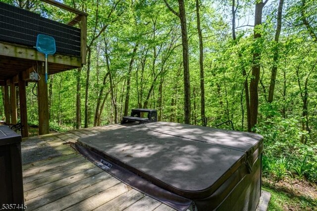 49 Sliker Rd, Lebanon Twp, NJ 08826 - wooden deck featuring a forest view
