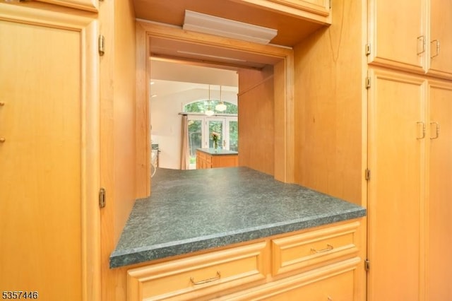 kitchen with dark countertops