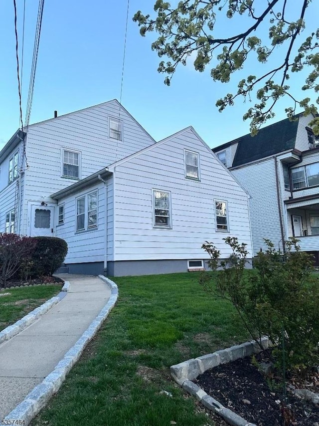 136 Nesbit Ter, Irvington Twp, NJ 07111 - view of side of property featuring a yard