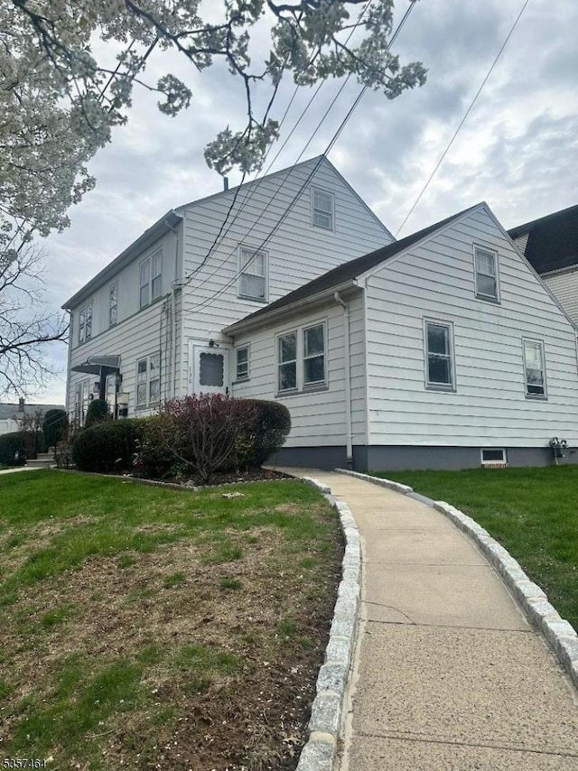 136 Nesbit Ter, Irvington Twp, NJ 07111 - view of property exterior featuring a yard