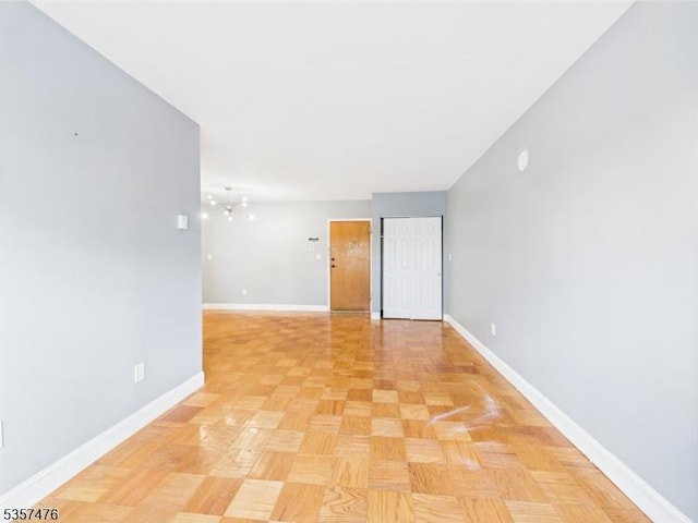 empty room with baseboards