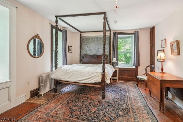19 E Mill Rd, Washington Twp, NJ 07853 - bedroom with radiator and wood finished floors