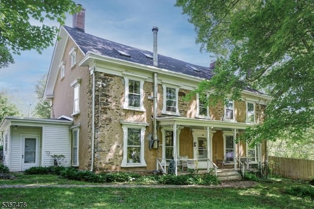 19 E Mill Rd, Washington Twp, NJ 07853 - view of front of home featuring a porch, stone siding, and a chimney