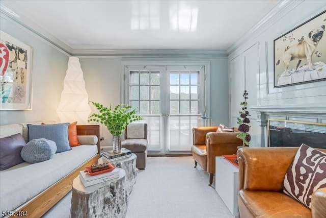 167 Lake End Rd, Rockaway Twp, NJ 07435 - living room featuring a glass covered fireplace, ornamental molding, and light colored carpet
