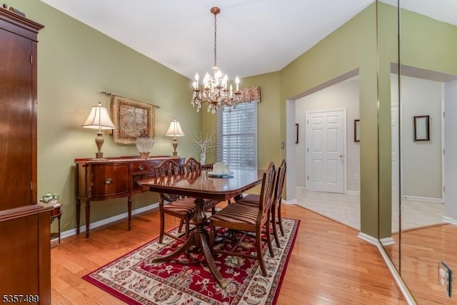 15 Pinehurst Cir, Clinton Twp, NJ 08801 - dining room featuring light wood-type flooring, a chandelier, and baseboards
