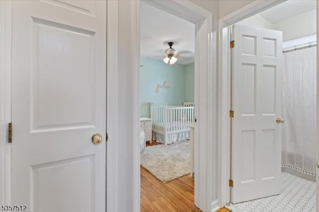 hallway featuring light wood-type flooring