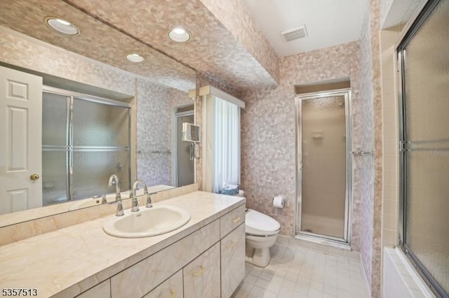 69 Village Dr, Bernards Twp, NJ 07920 - bathroom with a shower with door, toilet, vanity, tile patterned flooring, and wallpapered walls