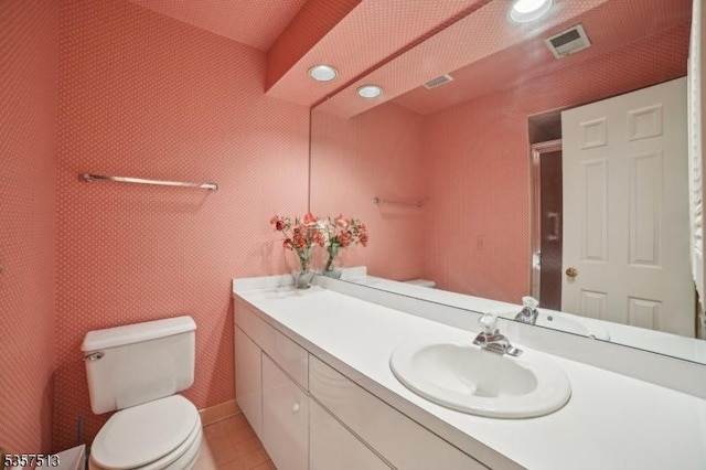 69 Village Dr, Bernards Twp, NJ 07920 - bathroom with toilet, vanity, recessed lighting, and tile patterned floors