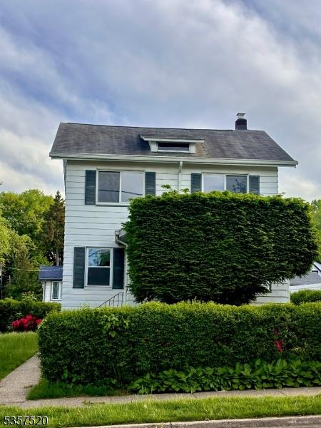 view of front of property with a chimney