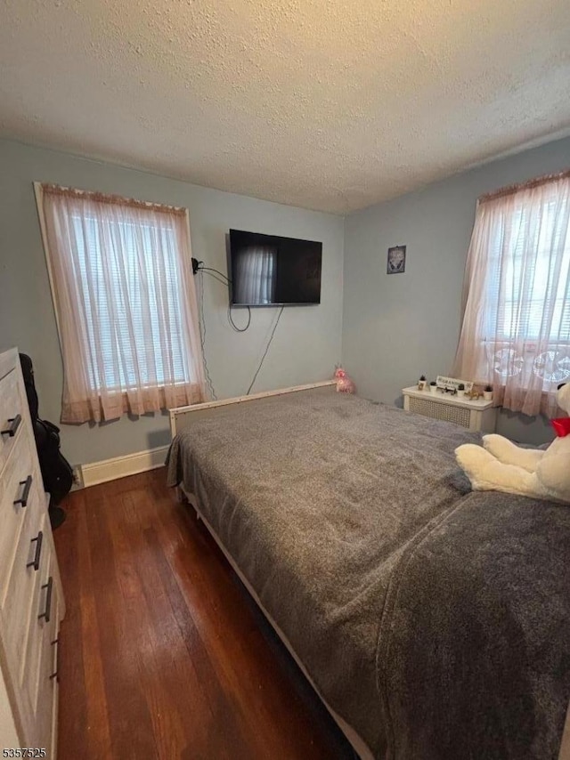 18 Park Dr N, West Orange Twp, NJ 07052 - bedroom with hardwood / wood-style floors, a textured ceiling, and baseboards