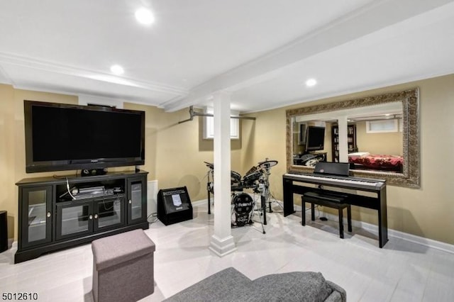 living area with baseboards and recessed lighting