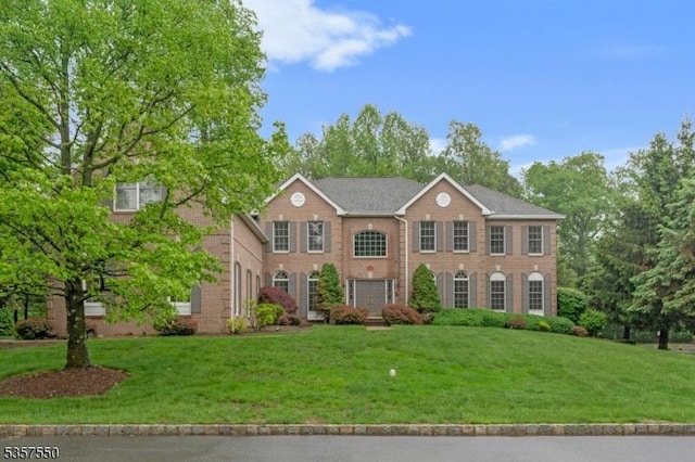102 Independence Dr, Bernards Twp, NJ 07920 - colonial inspired home with a front yard and brick siding