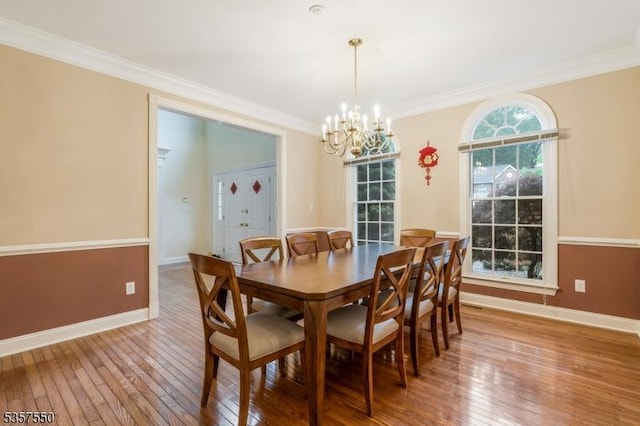 102 Independence Dr, Bernards Twp, NJ 07920 - dining space with hardwood / wood-style flooring, a chandelier, baseboards, and ornamental molding