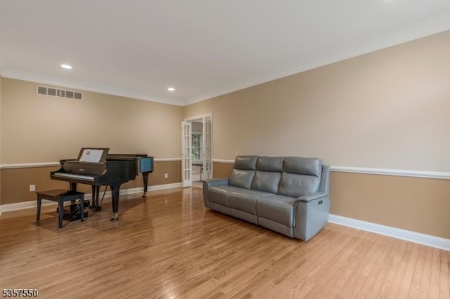 102 Independence Dr, Bernards Twp, NJ 07920 - living area with baseboards, light wood-style floors, recessed lighting, and crown molding