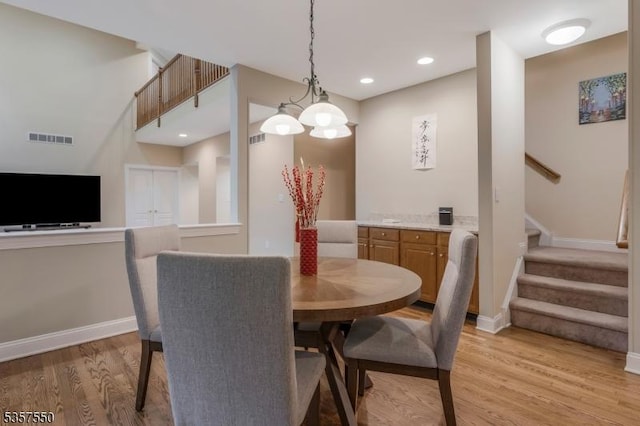 102 Independence Dr, Bernards Twp, NJ 07920 - dining room featuring stairway, light wood-style floors, baseboards, and recessed lighting
