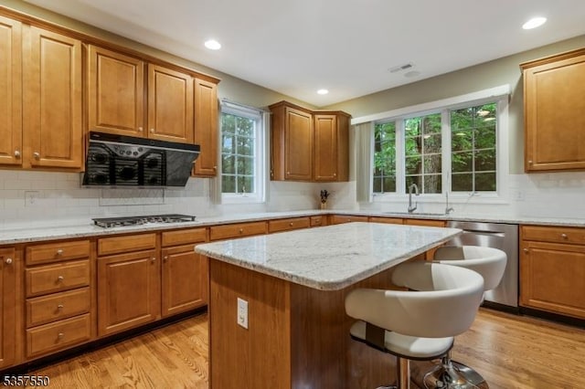 102 Independence Dr, Bernards Twp, NJ 07920 - kitchen featuring stainless steel appliances, a sink, light wood-style floors, ventilation hood, and recessed lighting
