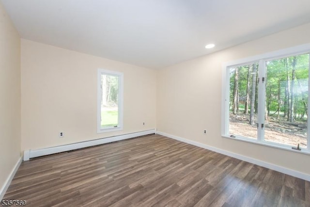 113 Spook Ridge Rd, Montague Twp, NJ 07827 - empty room featuring a baseboard heating unit, wood finished floors, baseboards, and recessed lighting