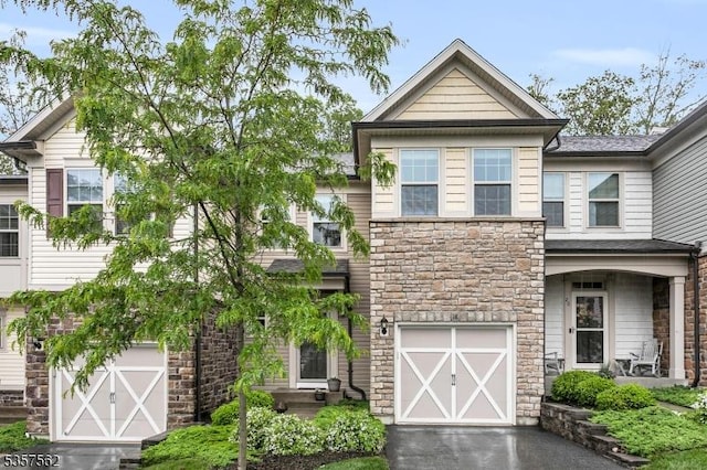 18 Brompton Pl, Randolph Twp, NJ 07869 - craftsman inspired home featuring stone siding, an attached garage, and asphalt driveway