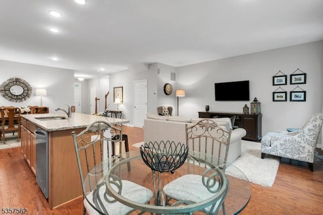 18 Brompton Pl, Randolph Twp, NJ 07869 - dining room with light wood-style floors, recessed lighting, and baseboards