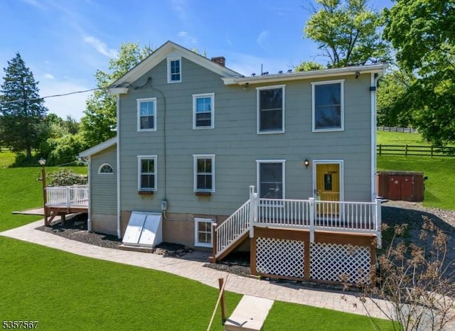 392 Pittstown Rd, Franklin Twp, NJ 08867 - back of house with a wooden deck and a chimney